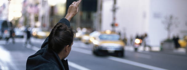 woman hailing cab main picture